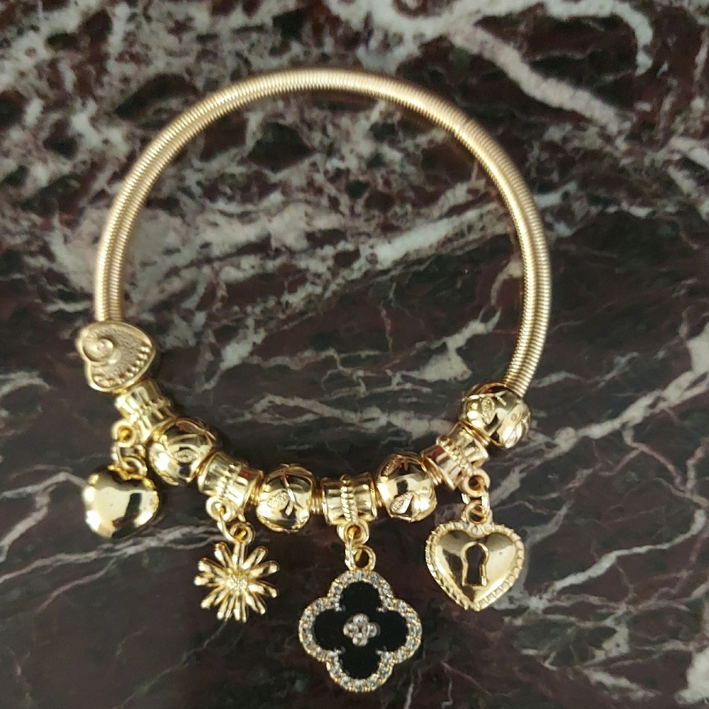 Gold Charm Bracelet with Black Flower Pendant